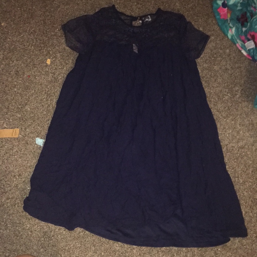 Dark blue long shirt.